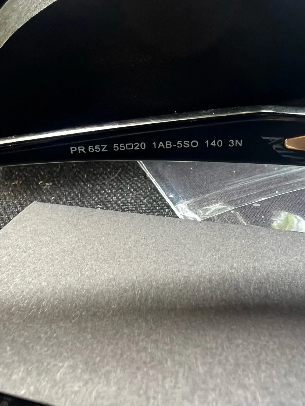 Prada Gold Frame Black Lens Round Sunglasses